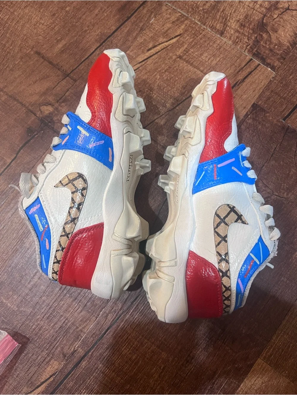 Nike Kids White Sneakers with Red & Blue Accents
